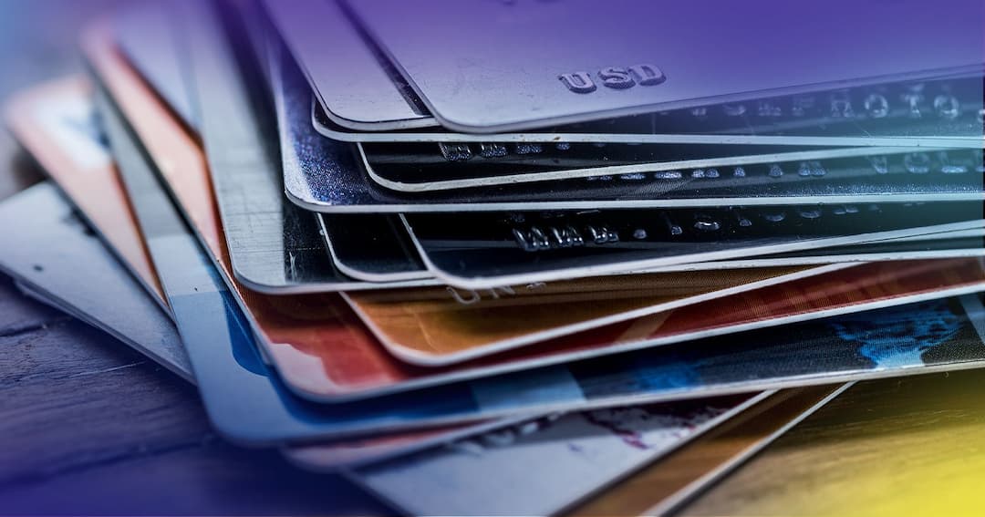 Pile of credit and debit cards.